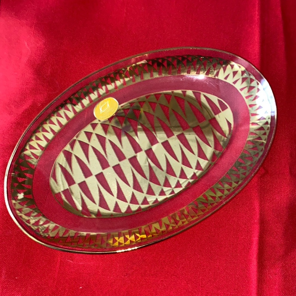 Mid century modern oval dish trimmed in gold on glass